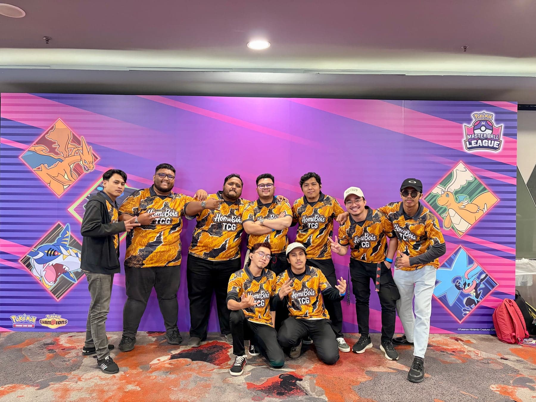 Homebois TCG team wearing the jersey at a tournament